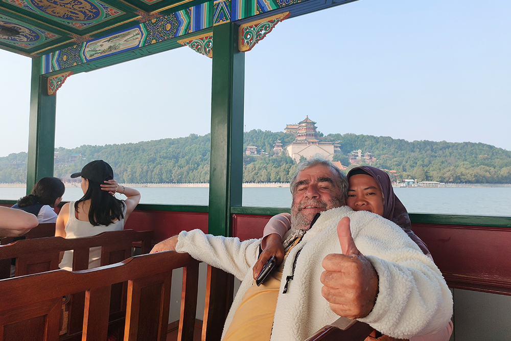 Tour 4 ,  Panda house . Summer Palace . Pearl factory . Olympic Center . Take a rickshaw go through hutong and visit a local family .  Yandaixiejie Hutong and Houhai lake .